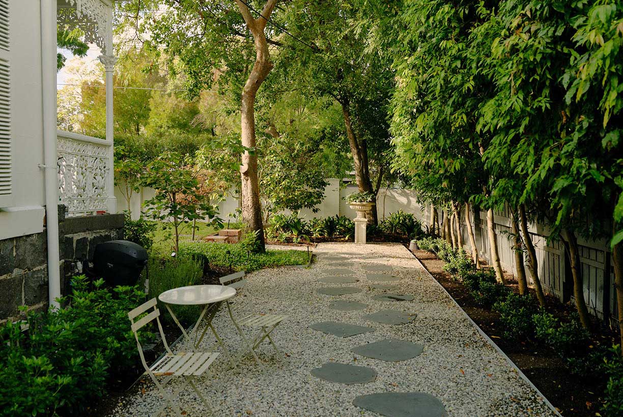 Milicent Road — gravel and stepping-stone path through avenue of trees